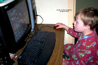 Kids with Down Syndrome love to play and work on computers.