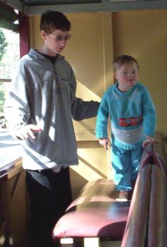Jacob playing on Puffing Billy with his brother Christopher - kids with Down Syndrome enjoy outings and going on choo choo trains just like other kids do.