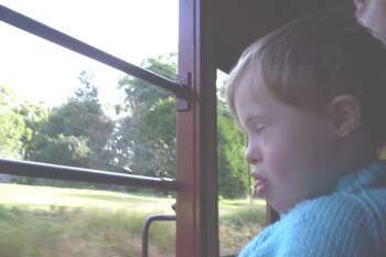 acob enjoying the view from Puffing Billy - Kids with Down Syndrome, or without Down Syndrome, would all most likely enjoy riding the Puffing Billy steam train