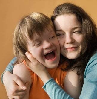 Girl with Down syndrome with sister