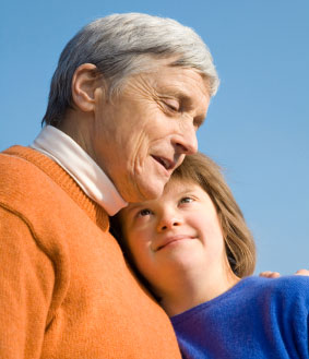 Girl with Downs syndrome with grandfather