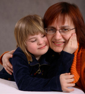 Mother / mum with daughter with Down syndrome