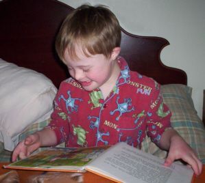 Jacob, age 6, using his intelligence in learning to read - A kid with Down Syndrome should not be limited in their growth by other peoples perceptions - most kids with Down Syndrome can go on to live productive lives within the community.